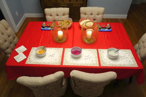 Photo of the dining room, decorated with red and gold accents